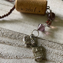 Load image into Gallery viewer, Seed bead wine cork necklace with beaded dangle and owl, moon and stars charms
